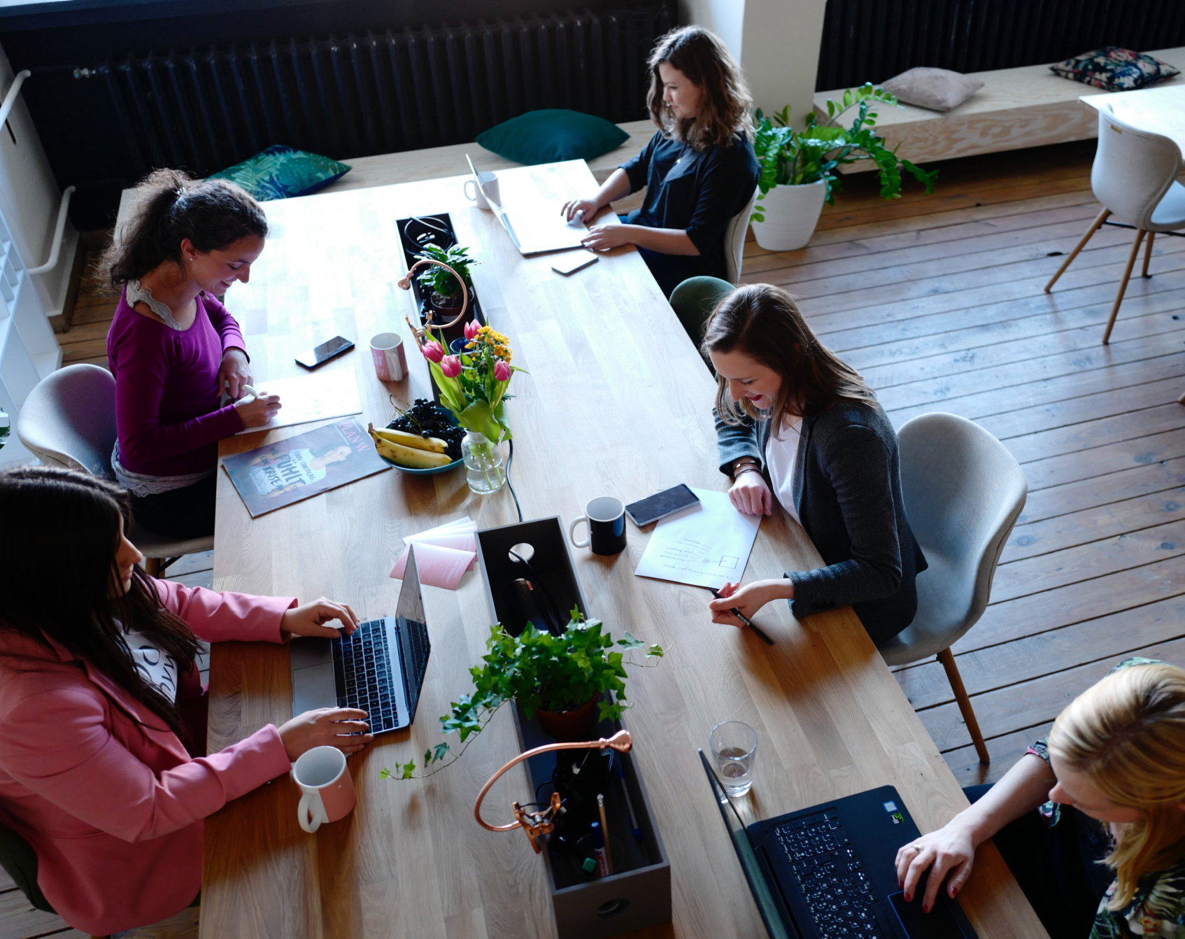 A group of office workers focusing on their projects.