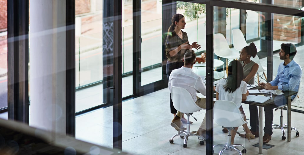 Group of young adults collaborating at an office